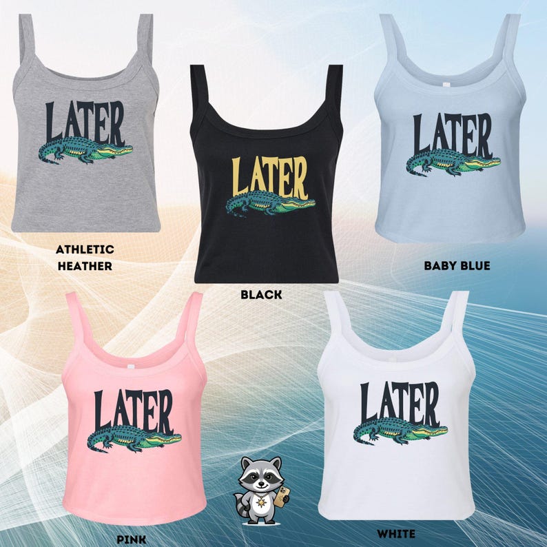May include: Five sleeveless tank tops in athletic heather, black, baby blue, pink, and white. Each top features the text LATER in a bold font above a graphic illustration of a green alligator. A small cartoon raccoon icon is positioned below.