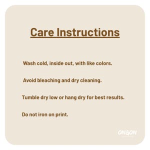 May include: A beige card with brown text detailing care instructions for clothing. The instructions include washing cold, avoiding bleach and dry cleaning, tumble drying low, and not ironing the print. The brand logo "ON&ON" is in the bottom right corner.