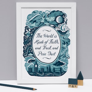 May include: A framed art print with a white border, featuring a teal and blue illustration with text that reads "The World is Made of Faith, and Trust, and Pixie Dust." The artwork includes images of Peter Pan, Wendy, Tinkerbell, and London landmarks.