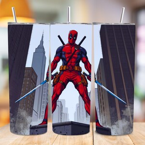 Deadpool-themed design featuring the red and black masked antihero standing heroically on a rooftop between tall city skyscrapers, holding twin katanas. Illustrated in a gritty comic style with bold outlines, dramatic shadows, and a red, black, and gray color palette. Perfect for sublimation crafting, 20oz tumblers, and superhero-themed artwork. This high-resolution digital download captures Deadpool’s iconic look and attitude in a bold, urban setting.