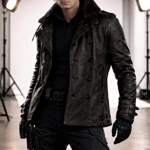 May include: A black leather jacket with a fur collar, worn over a black shirt and pants. The jacket has a double-breasted design with large buttons. The person is also wearing black gloves and a belt.