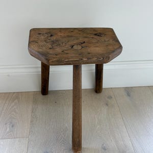 Antique rustic three legged stool