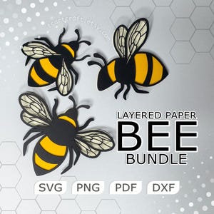 Puede incluir: Tres abejas de papel en capas de color negro y amarillo con alas translúcidas. El texto dice LAYERED PAPER BEE BUNDLE, SVG, PNG, PDF, DXF. El diseño presenta cuerpos de insectos detallados con patrones de rayas y alas delicadas.