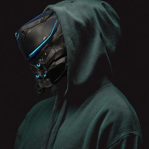 May include: A futuristic black helmet with blue neon accents is partially obscured by a dark green hooded sweatshirt. The helmet has a complex, angular design, suggesting advanced technology. The overall aesthetic is dark and mysterious.