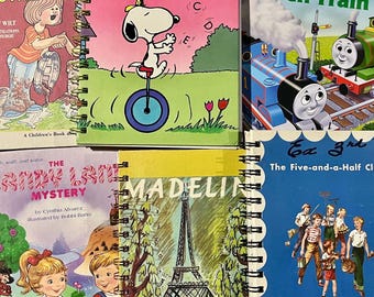 Diario infantil con historia original, 30 páginas blancas lisas, encuadernación en espiral.