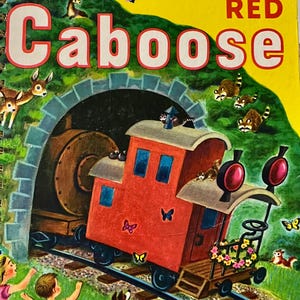 May include: A vintage children's book cover titled "The Little Red Caboose." The illustration shows a red caboose on train tracks emerging from a tunnel, with forest animals and children in the foreground. The cover is yellow with the title in large white letters.