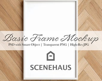 Op de afbeelding: Een witte rechthoekige frame-mockup met de tekst "Basic Frame Mockup" en "SCENEHAUS" op een lichtbruine houten achtergrond. Het frame is leeg en biedt ruimte voor kunstwerken of ontwerpen. De achtergrond heeft een visgraatpatroon.