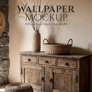Puede incluir: Un aparador de madera rústica con cajones y puertas, coronado por una cesta tejida y un jarrón texturizado con hierbas secas. La imagen incluye el texto "WALLPAPER MOCKUP".