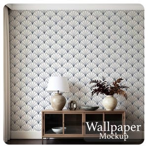 May include: A room interior featuring a wallpaper mockup with a repeating fan-shaped pattern in navy blue on a white background. A wooden cabinet with glass doors holds a lamp, vases, and decorative items. The text "Wallpaper Mockup" is visible.