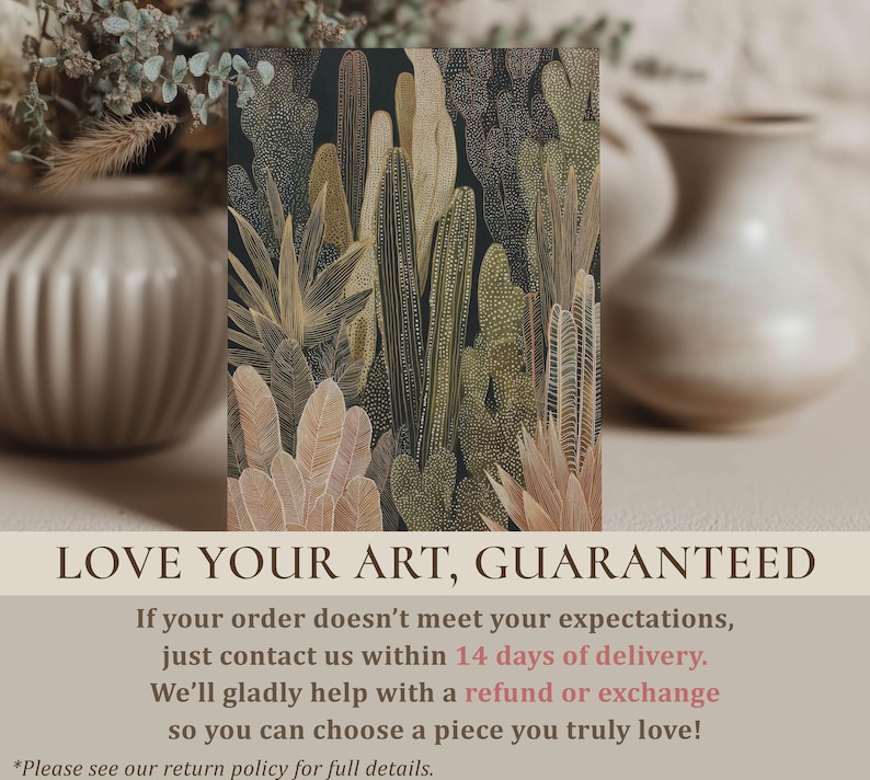 Muted earth-tone cacti and leaf motifs on a dark field, smaller art print standing on a soft surface with blurred ceramic vases and foliage in the background.
