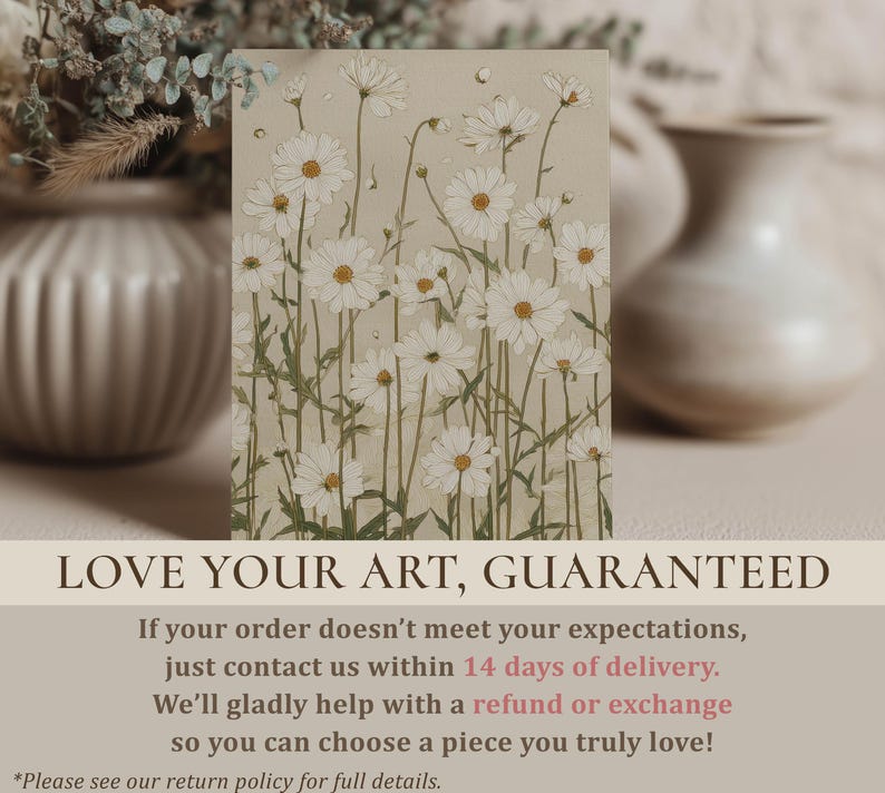 Close-up wall art print of a daisy meadow with white blooms and sage green stems on beige, styled on a tabletop with blurred vases and a guarantee overlay.