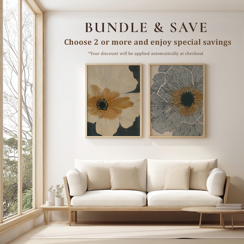 Coordinated 2-piece set of beige and black linework flower art print designs with warm golden centers, a calm modern gallery wall pair displayed in matching frames.