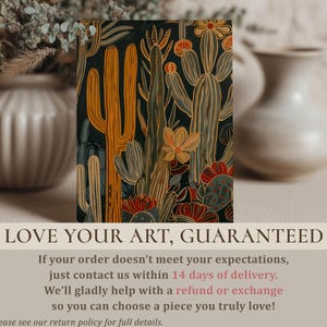 Warm cactus wall art print with mustard, rust and teal accents, cozy modern feel; smaller art print standing on a soft-toned surface with blurred ceramic vases and foliage and a “Love your art, guaranteed” overlay.