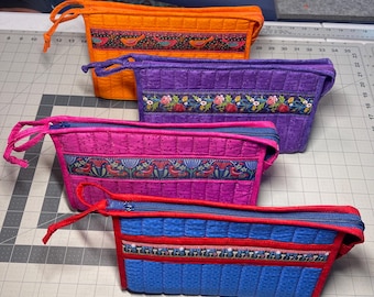 Handcrafted quilted cosmetic and accessory bags