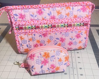 Handmade quilted cosmetic and accessory bags.