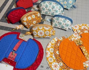 Handmade quilted storage pouches.