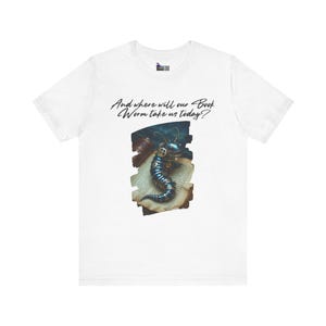 May include: White t-shirt featuring a steampunk-style bookworm design. The worm is metallic blue and silver, with intricate details. The shirt also has the text: "And where will our Book Worm take us today?"