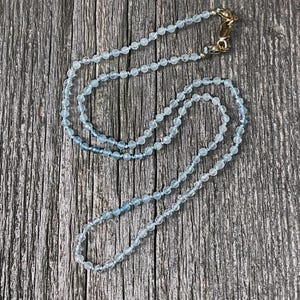 pale blue aquamarine ombre necklace hand knotted on silk with gold filled lobster clasp