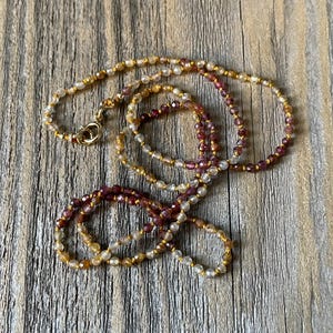 14k tiny multicolor sapphire necklace hand knotted on mustard silk delicate beads