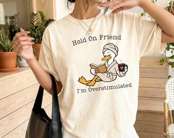 Hold On Partner I'm Overstimulated Shirt, Silly Goose Meme Tee, Funny Book Lover Gift, Tired Mama Coffee Lover ,Trendy Goose, Librarian Tee