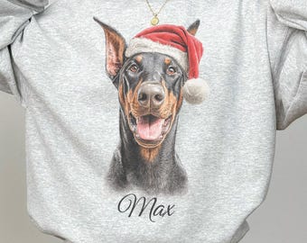 Custom Name Doberman Santa Christmas Sweatshirt, Dobie Dog in Festive Santa Hat Sweater, Dog Lover Shirt, Funny Christmas Gift Crewneck