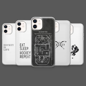 May include: A collection of five phone cases with hockey-themed designs. The cases feature text like "Hockey is Life" and "Eat. Sleep. Hockey. Repeat." One case displays an ice hockey rink diagram. The cases are white and black.