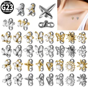 May include: A set of three ceramic mugs with a speckled, matte finish. The mugs are in shades of cream, light gray, and dark gray. Each mug has a simple, minimalist design and a rounded handle.