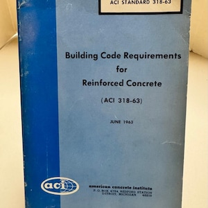 May include: A blue softcover technical manual titled Building Code Requirements for Reinforced Concrete (ACI 318-63), published in June 1963 by the American Concrete Institute. The cover features a vertical blue stripe and the ACI logo in white.