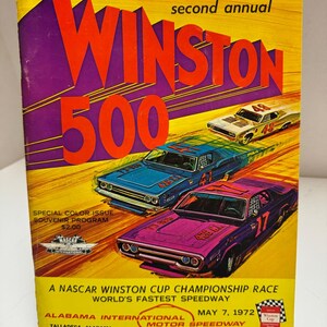 May include: A vintage souvenir program for the second annual Winston 500 NASCAR race held on May 7, 1972, at the Alabama International Motor Speedway. The cover features bold red and purple text, illustrations of three race cars, and the price $2.00.