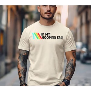 Camiseta de colores cómodos Arc Raiders Gooping Era, regalo para gamers, amantes de los videojuegos, regalo de cumpleaños para él o ella, divertida camiseta de juegos.
