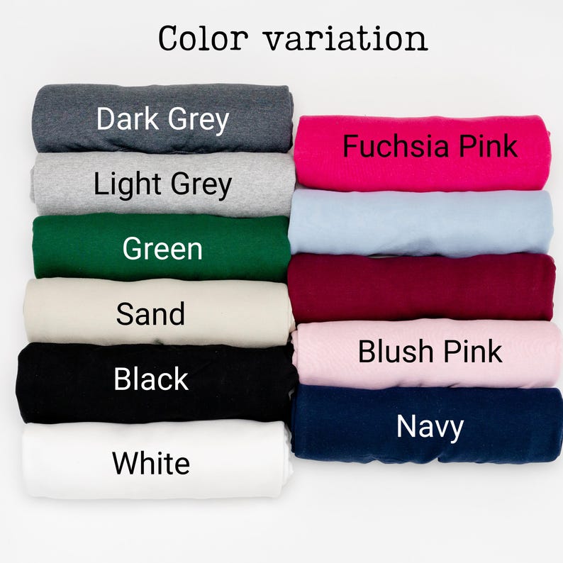 May include: Image showing a color chart with various fabric swatches. Colors include dark grey, light grey, green, sand, black, white, fuchsia pink, light blue, burgundy, blush pink, and navy. The text "Color variation" is at the top.