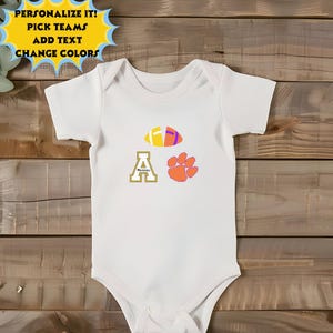 a baby bodysuit with a paw print on it