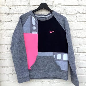 nike mini swoosh oversized boxy sweatshirt in fuchsia pink