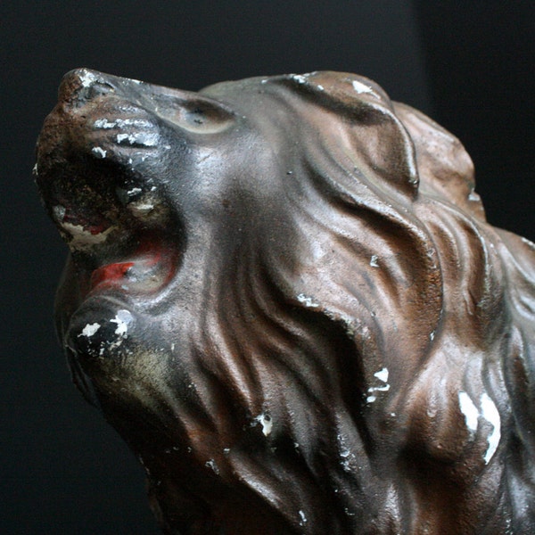 Old chalkware lion brings back end-of-summer carnival nostalgia