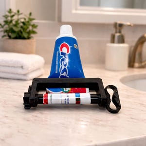 Exprimidor de pasta de dientes (paquete de 3) con rodillo negro para organizar el baño