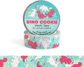 May include: A roll of turquoise washi tape with a repeating pattern of pink and white dinosaur cookie shapes and colorful sprinkles. The tape is labeled "DINO COOKIE Washi Tape by LuxCups Creative 15 mm x 10 m 0.59 IN x 393 IN (10.9 YD)"
