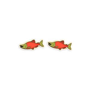 May include: A pair of salmon-shaped earrings. Each earring features a red body, a yellow tail and fins, and a green head. The earrings have a gold-colored outline and are set against a white background.