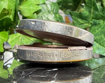 Estuche de polvera vintage en tono plateado - Paris Arabian Chicago