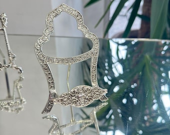 Soporte para placa de metal ornamentado, expositor