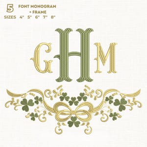 Könnte beinhalten: Gesticktes Design mit den Buchstaben GHM in Gold und Grün, mit einem dekorativen gold-grünen Blumenrand. Der Text oben lautet "FONT MONOGRAM + FRAME" und "GRÖSSEN 10cm 13cm 15cm 18cm 20cm".