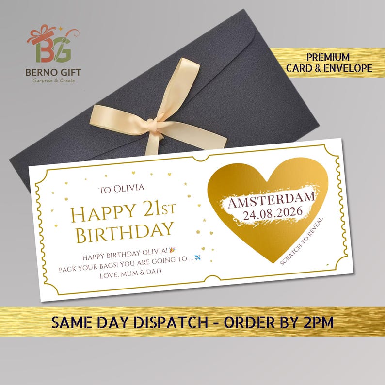 May include: A birthday gift card with a gold heart and the text "Happy 21st Birthday". The card is white with gold accents and a black envelope tied with a beige ribbon. The card says "Amsterdam 24.08.2026" and "Scratch to Reveal".