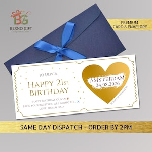 May include: A navy blue envelope with a blue ribbon bow, paired with a white and gold birthday card. The card reads "Happy 21st Birthday Olivia" and includes a scratch-off heart revealing "Amsterdam 24.08.2026".