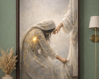 May include: A framed canvas art print depicts a person in a white robe kneeling, reaching for a hand. The person's robe has gold-colored cracks and a bright light emanating from the chest area. Another figure in white reaches down to touch the person's hand.