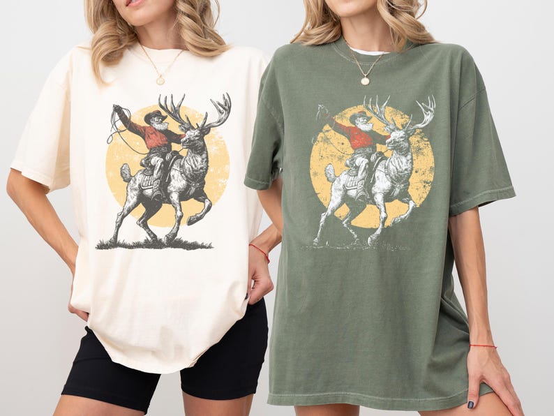 Western Christmas Cowboy Santa Clipart, Vintage Rodeo Reindeer T-shirt Design, Distressed Farmhouse Christmas PNG SVG, Retro Engraving Style Digital Download, Rustic Outlaw Santa Sublimation, Unique Holiday Graphic Tee File, Engraved Reindeer Rider Art, Muted Color Retro Christmas Print, Christmas Shirt Maker Resource, Cowboy Santa Riding Elk Drawing.