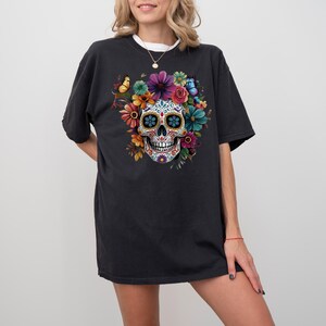 Sugar Skull Floral PNG file for Sublimation, Clipart, and Craft Projects. Vibrant Day of the Dead (Dia de los Muertos) Mexican skull art featuring colorful flowers. High-resolution digital download for T-shirts, mugs, and Halloween designs.