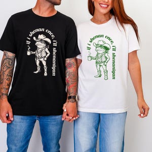 funny frog cowboy st patricks day png, retro shenanigan frog shirt design, vintage western irish green frog, frog riding cowboy funny illustration, st paddys day green frog art, distressed green cowboy frog sublimation, whimsical irish shenanigan digital download, lucky frog cowboy hat western png, funny st patricks day humor for adults, vintage woodcut style frog cowboy design