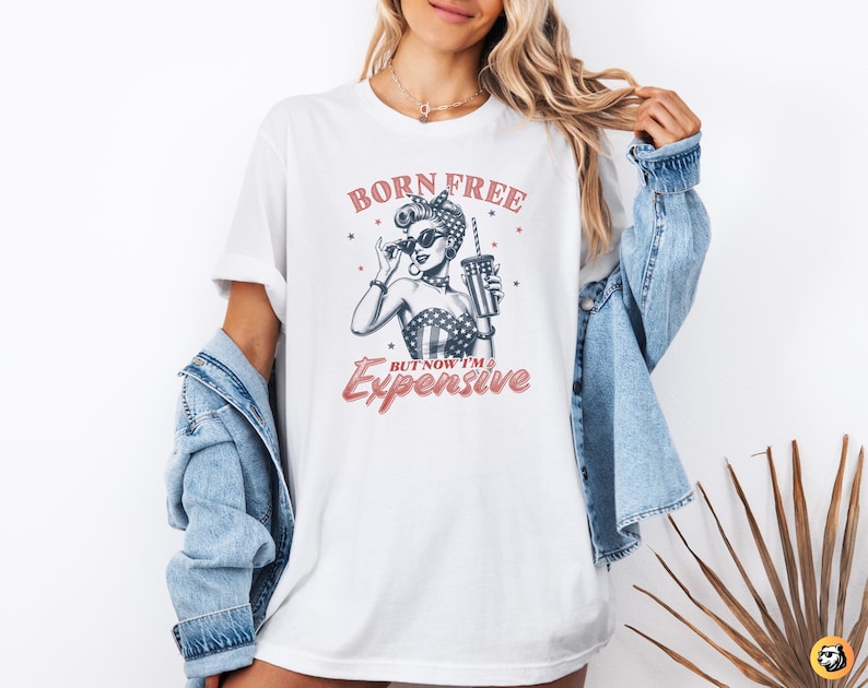 born free expensive png, retro patriotic girl sublimation, funny 4th of july digital art, vintage pinup independence day, sarcastic semiquincentennial design, woodcut style patriotic woman, usa 250th anniversary graphic, charcoal black engraving print, vintage red 4th july typography, sassy american flag girl
