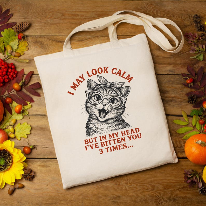 funny cat quote png, i may look calm meme, sarcastic cat mom gift, retro sunset cat art, sassy kitten sublimation, vintage cat with glasses, cat wearing bandana png, humorous feline digital download, crazy cat lady design, animal meme graphics