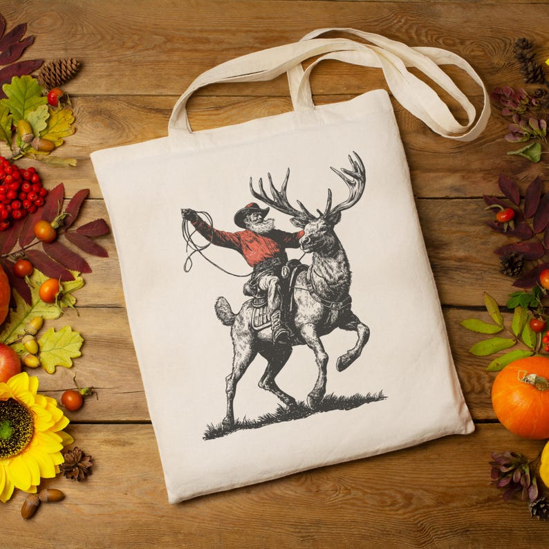 Western Christmas Cowboy Santa Clipart, Vintage Rodeo Reindeer T-shirt Design, Distressed Farmhouse Christmas PNG SVG, Retro Engraving Style Digital Download, Rustic Outlaw Santa Sublimation, Unique Holiday Graphic Tee File, Engraved Reindeer Rider Art, Muted Color Retro Christmas Print, Christmas Shirt Maker Resource, Cowboy Santa Riding Elk Drawing.