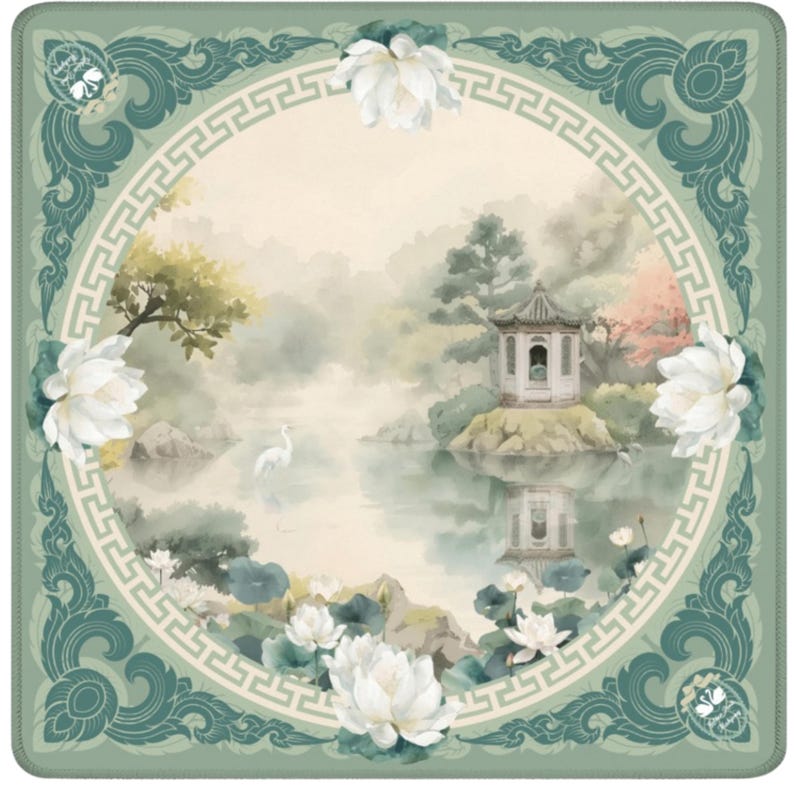 May include: Square scarf with a serene watercolor scene. The design features a tranquil lake with a pagoda, white flowers, and a white bird. The border is a teal green with decorative elements and a repeating pattern.